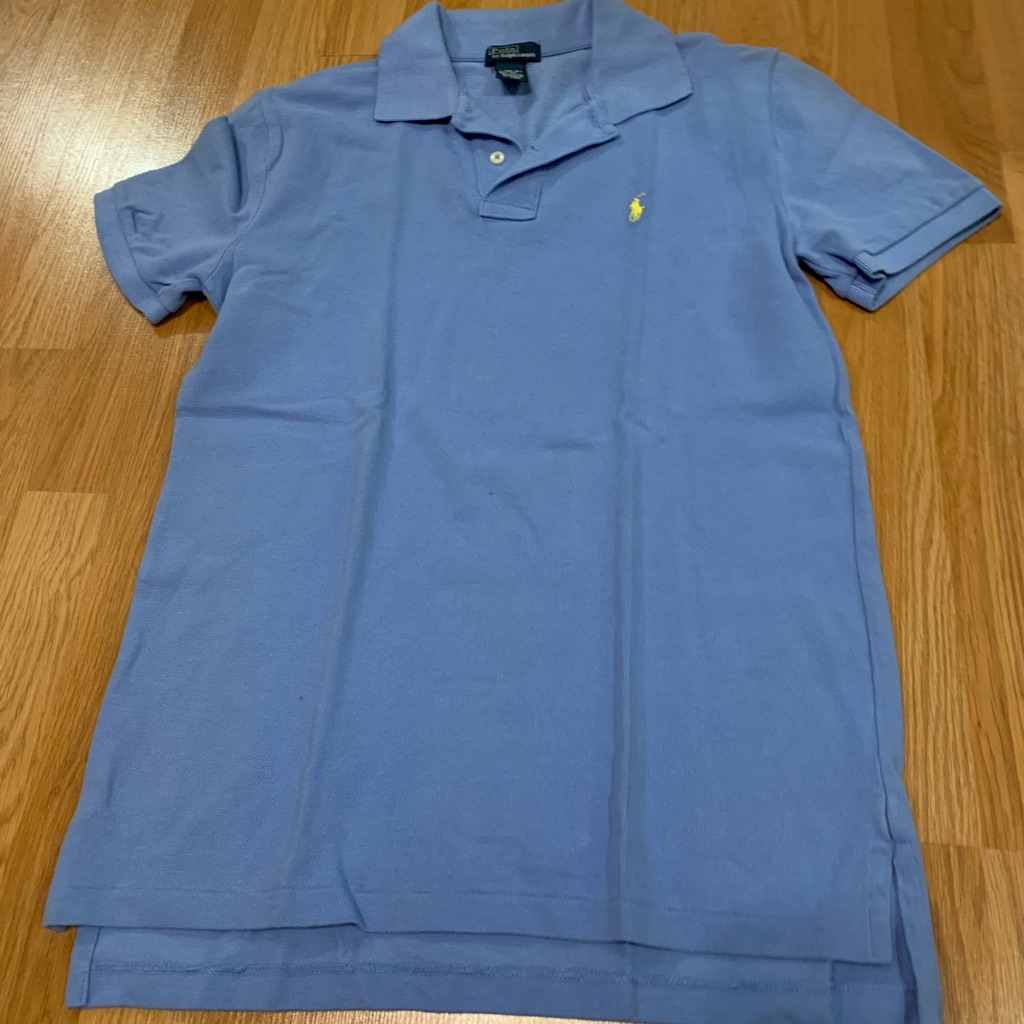 Light Blue Polo Shirt With Yellow Polo Logo